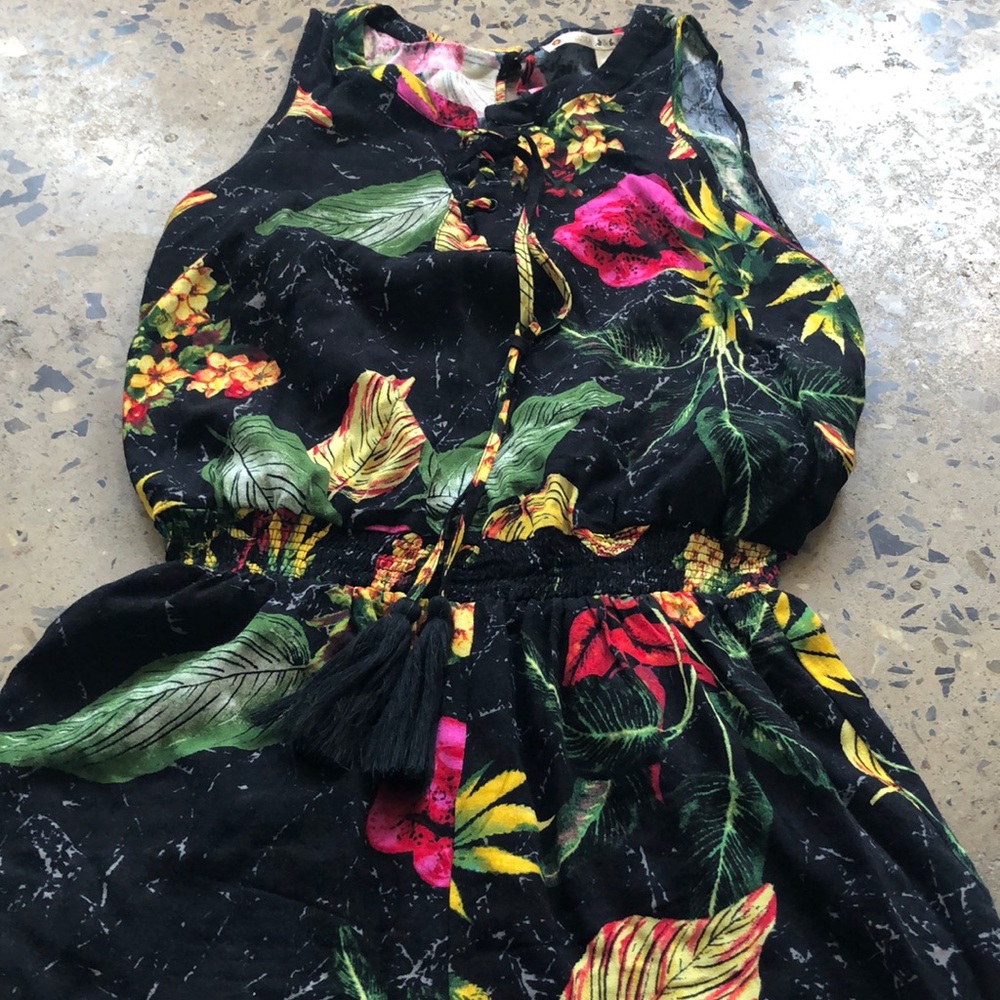 A flower romper. Chelsea and violet